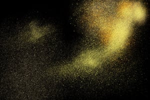 Freeze motion of yellow powder exploding, isolated on black, dark background. Abstract design of yellow dust cloud. Particles explosion screen saver, wallpaper.-2